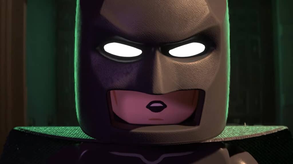 ドラマチックなクローズアップでは、レゴバットマンのマスクが彼の内面の葛藤を反映して分裂している様子が映し出されている。