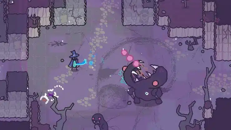 Scrabdackleの暗いアリーナスタイルの戦闘シーンで、小さな魔法使いが巨大な変異した敵と対峙する