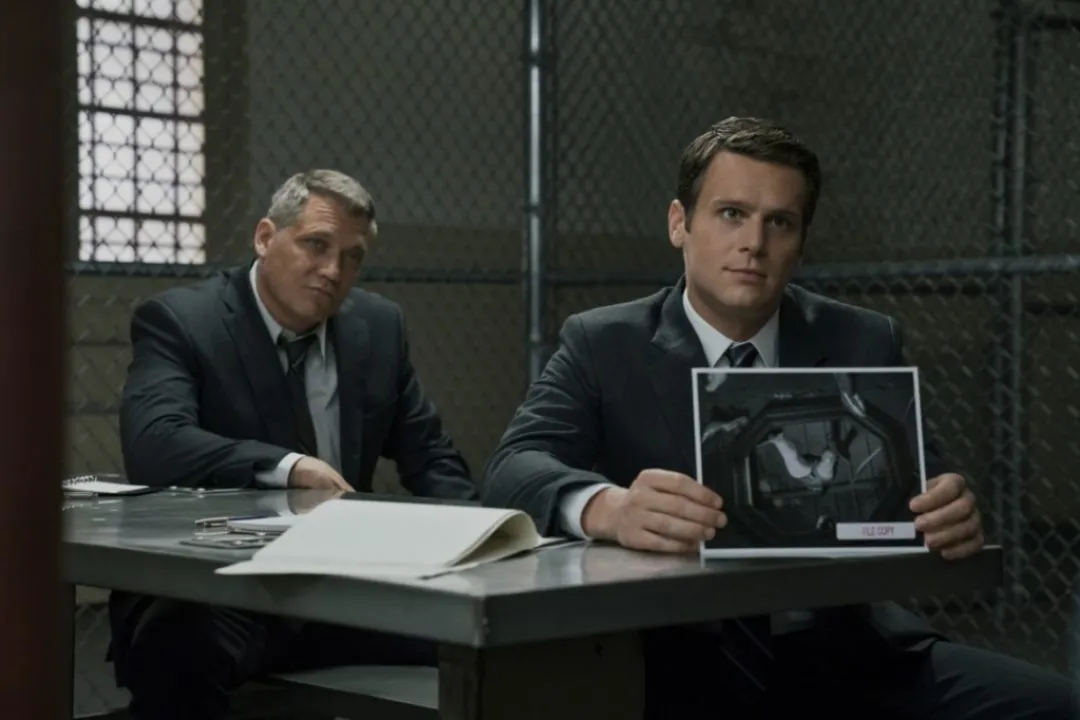 Mindhunter Season 2 Launches This August on Netflix. This image is part of an article about the best shows like True Detective.