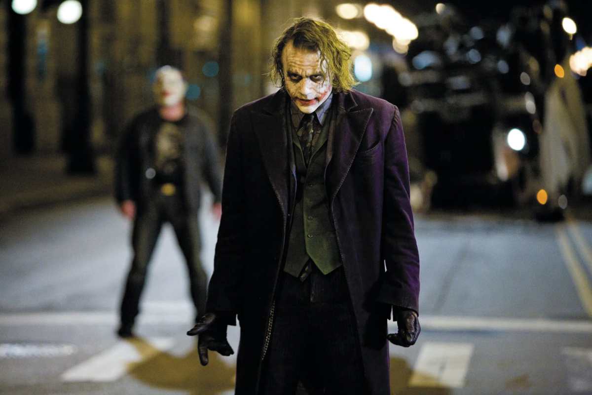 christopher nolan linear storytelling in the dark knight due to the chaos role of the joker versus batman