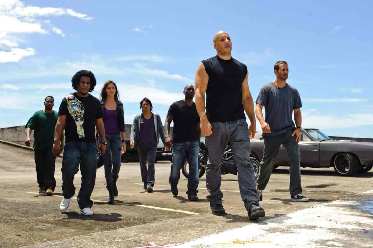 Fast Five exists at center of Fast & Furious franchise, in-between grounded human entries and insane action blockbuster physics-breaking spectacle