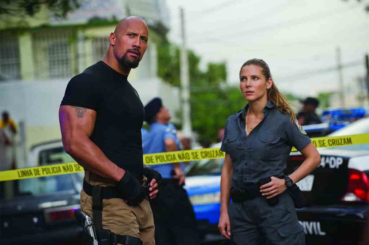 Fast Five exists at center of Fast & Furious franchise, in-between grounded human entries and insane action blockbuster physics-breaking spectacle