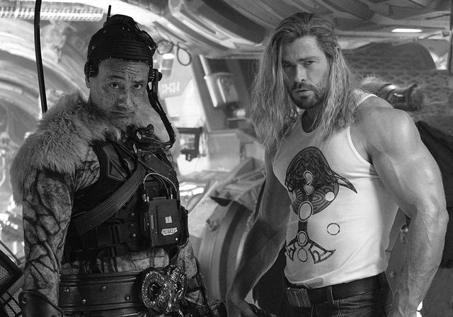 Chris Hemsworth has shared a photo of his massive biceps, and his gut is apparently gone as Thor: Love and Thunder film development wraps.