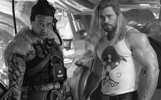 Chris Hemsworth has shared a photo of his massive biceps, and his gut is apparently gone as Thor: Love and Thunder film development wraps.