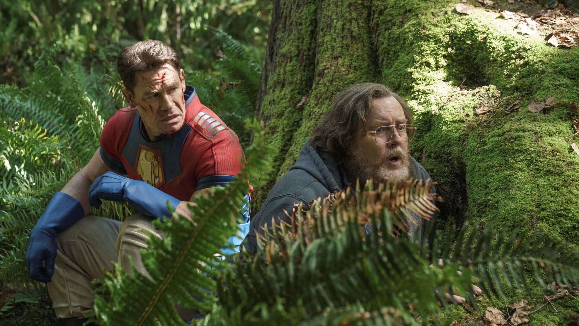 Peacemaker episode 7 review Stop Dragon My Heart Around hair metal music effective to James Gunn themes positive character growth development