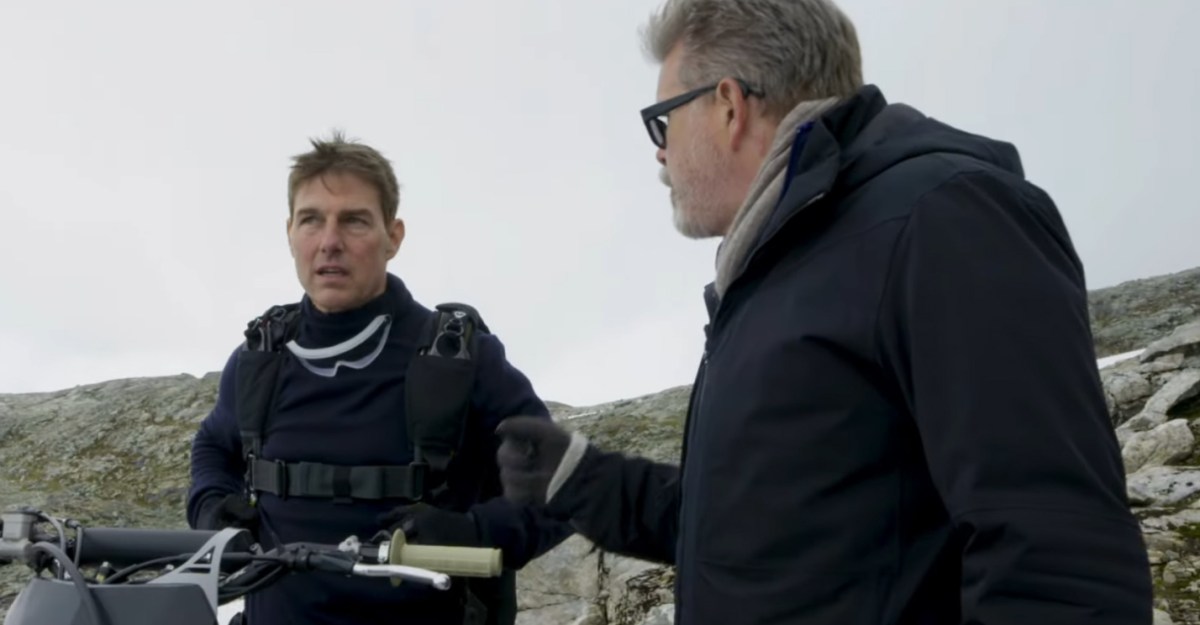 watch stunt Tom Cruise jumps off a cliff on a motorcycle in Mission: Impossible Dead Reckoning Part 1