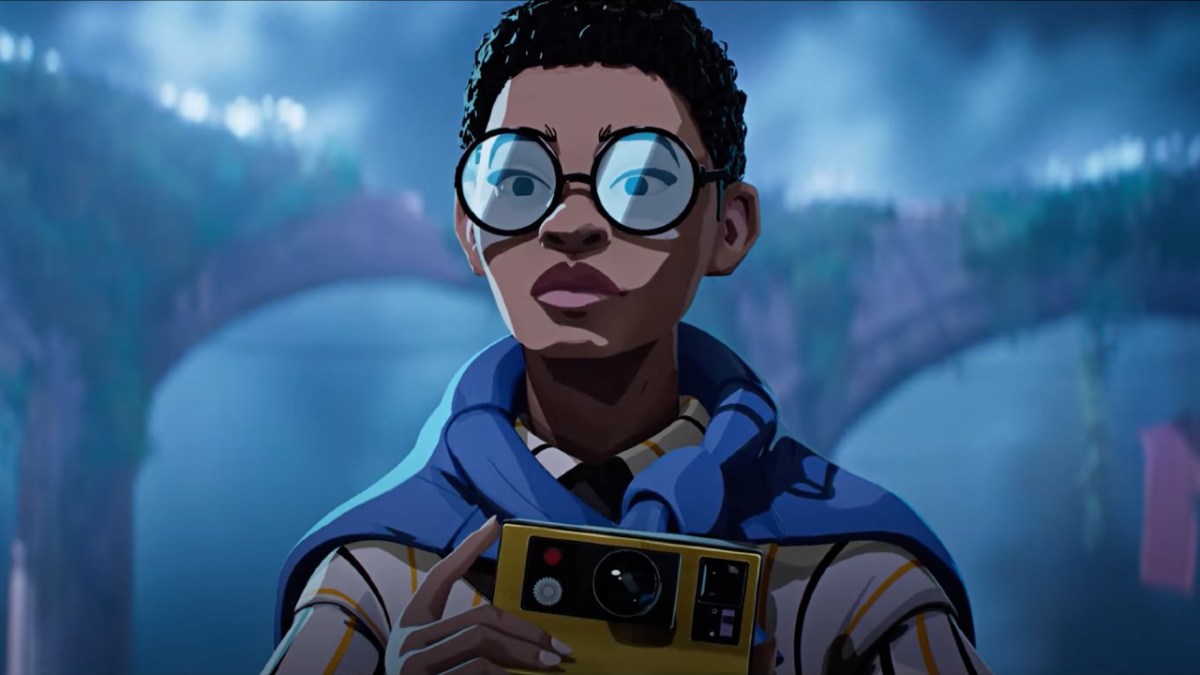 Estelle holding her Polaroid camera in the story trailer for Season: A Letter to the Future.