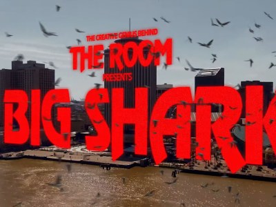 The Room director Tommy Wiseau has debuted the trailer for Big Shark, his directorial follow-up, about a big shark and self-aware meta comedy.