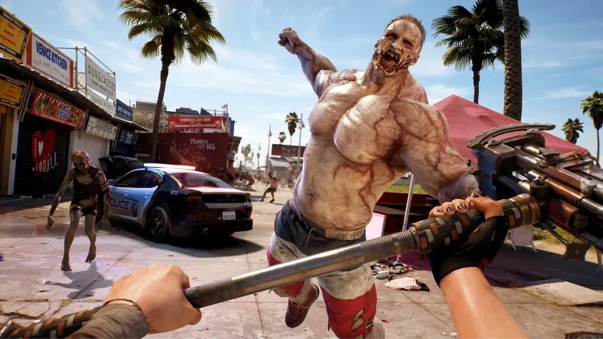 Does Dead Island 2 Have a Photo Mode Featured Image - A Brawny Zombie leaps towards the screen, where the character, in first-person view, holds out a weapon.