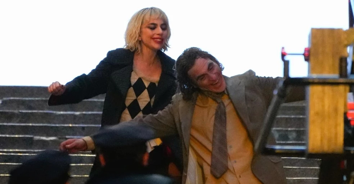 Joker: Folie à Deux (Joker 2) production photos show Lady Gaga and Joaquin Phoenix in full makeup on the first movie iconic concrete stairs.