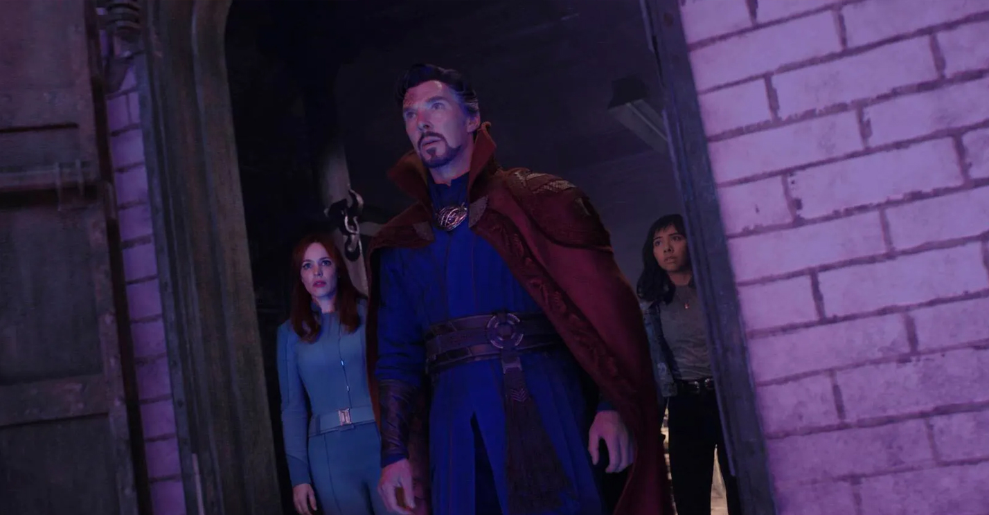 Doctor Strange leads Christine Palmer and America Chavez into a purple-lit room