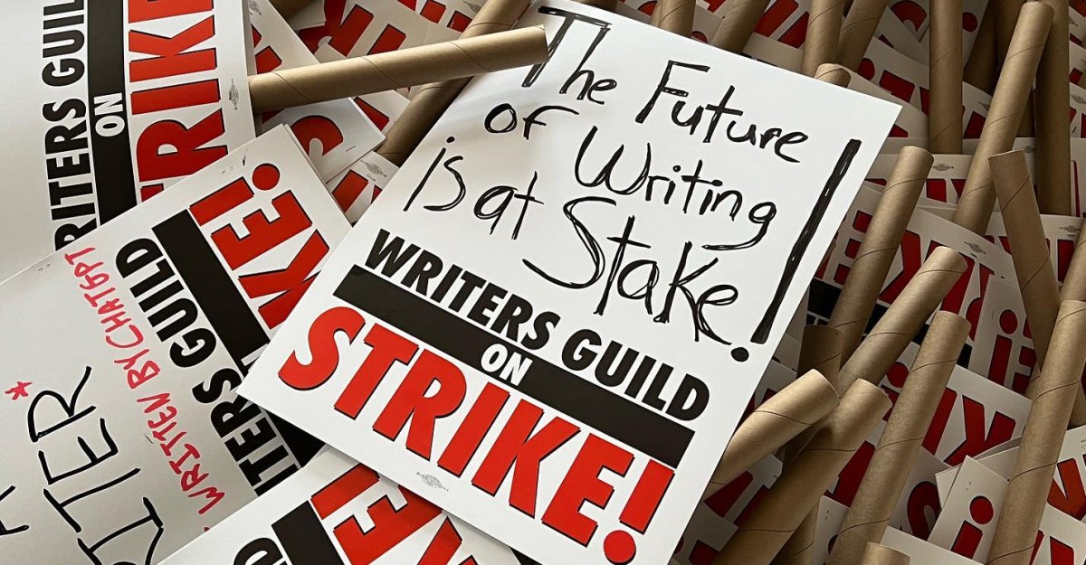 The Writers Guild of America (WGA) has gone on strike due to AMPTP stonewalling, so your movies and TV shows could suck for a while. / Alliance of Motion Picture and Television Producers / protest signs