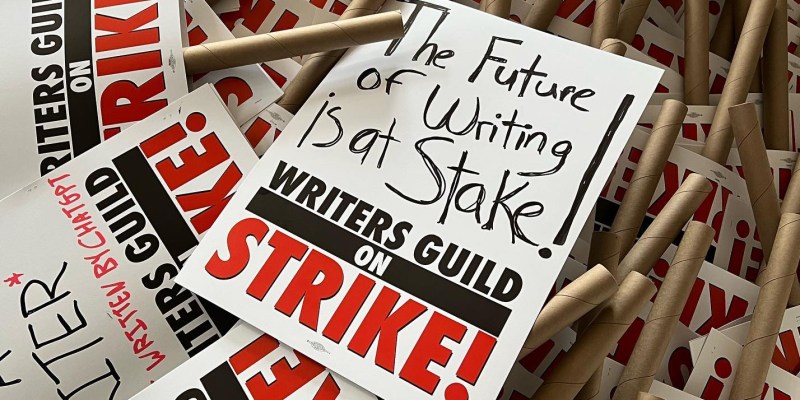 The Writers Guild of America (WGA) has gone on strike due to AMPTP stonewalling, so your movies and TV shows could suck for a while. / Alliance of Motion Picture and Television Producers / protest signs