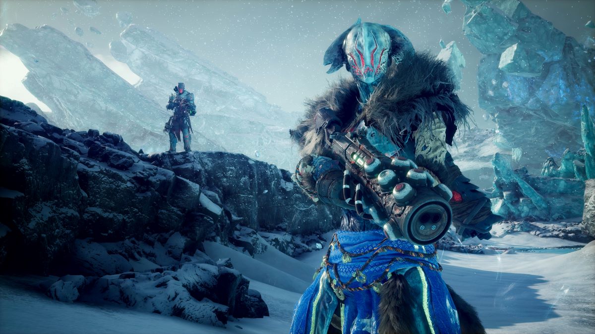 Outriders hold large guns as they face an icy mountain