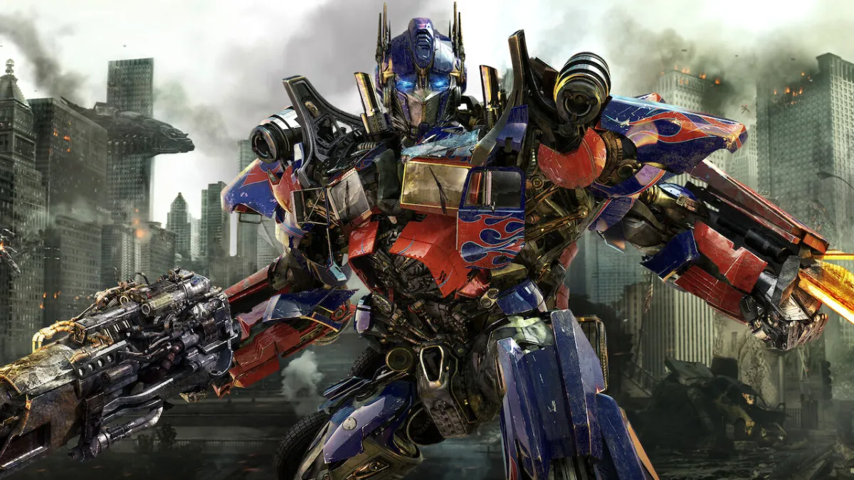 Optimus Prime with his weapons drawn.
