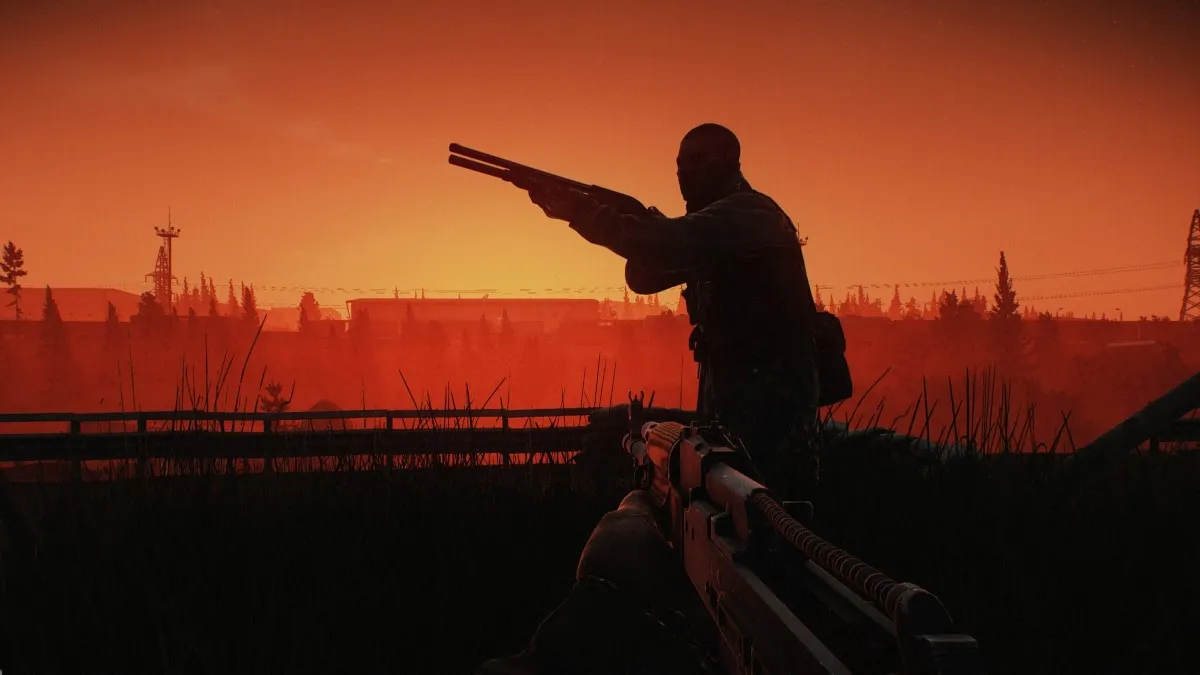 Why Now is The Best and Worst Time to Start Playing Escape from Tarkov - Fewer Mega Chads. A player character is silhouetted against an orange sunset.