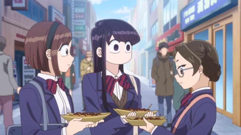 Komi stares widely in shock