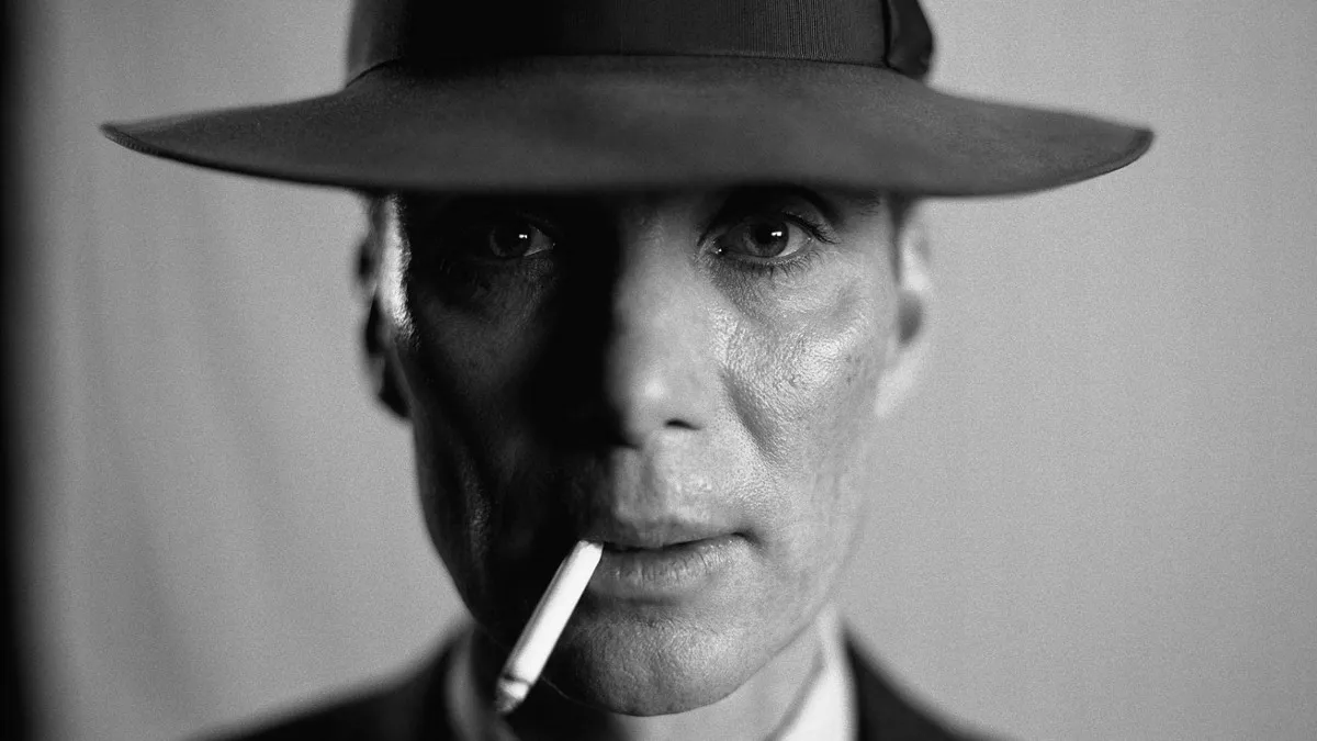 Is Oppenheimer A True Story? - Oppenheimer star Cillian Murphy gazes at the camera in black and white.