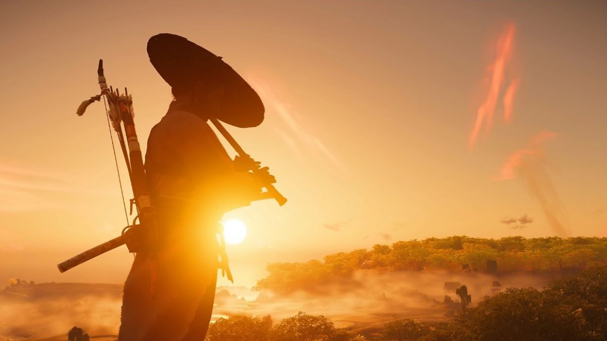 The script for the Ghost of Tsushima movie is complete. The image shows a samurai playing a flute while silhouetted by the setting sun.