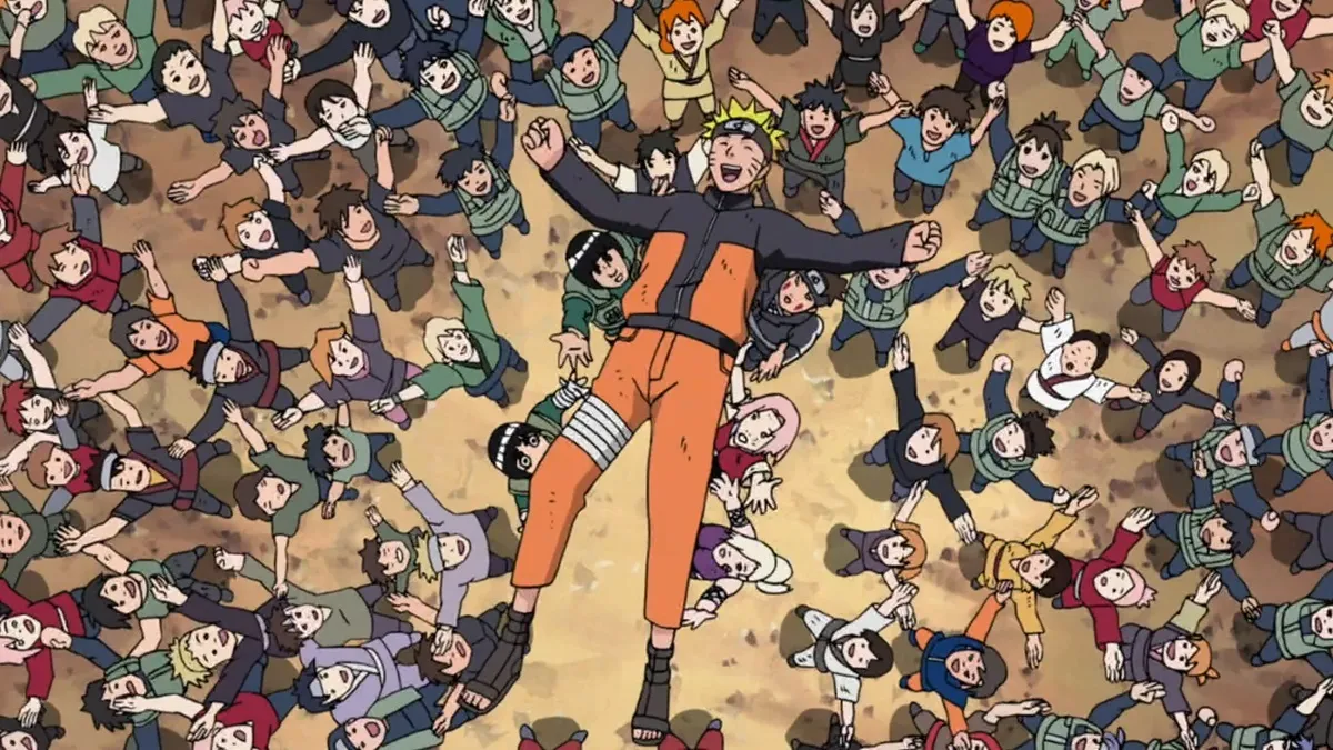 An image of a group of people waiting to catch Naruto as he falls through the air in one of the show's more heartfelt moments as part of an article on how the Big Three of anime had hearts.