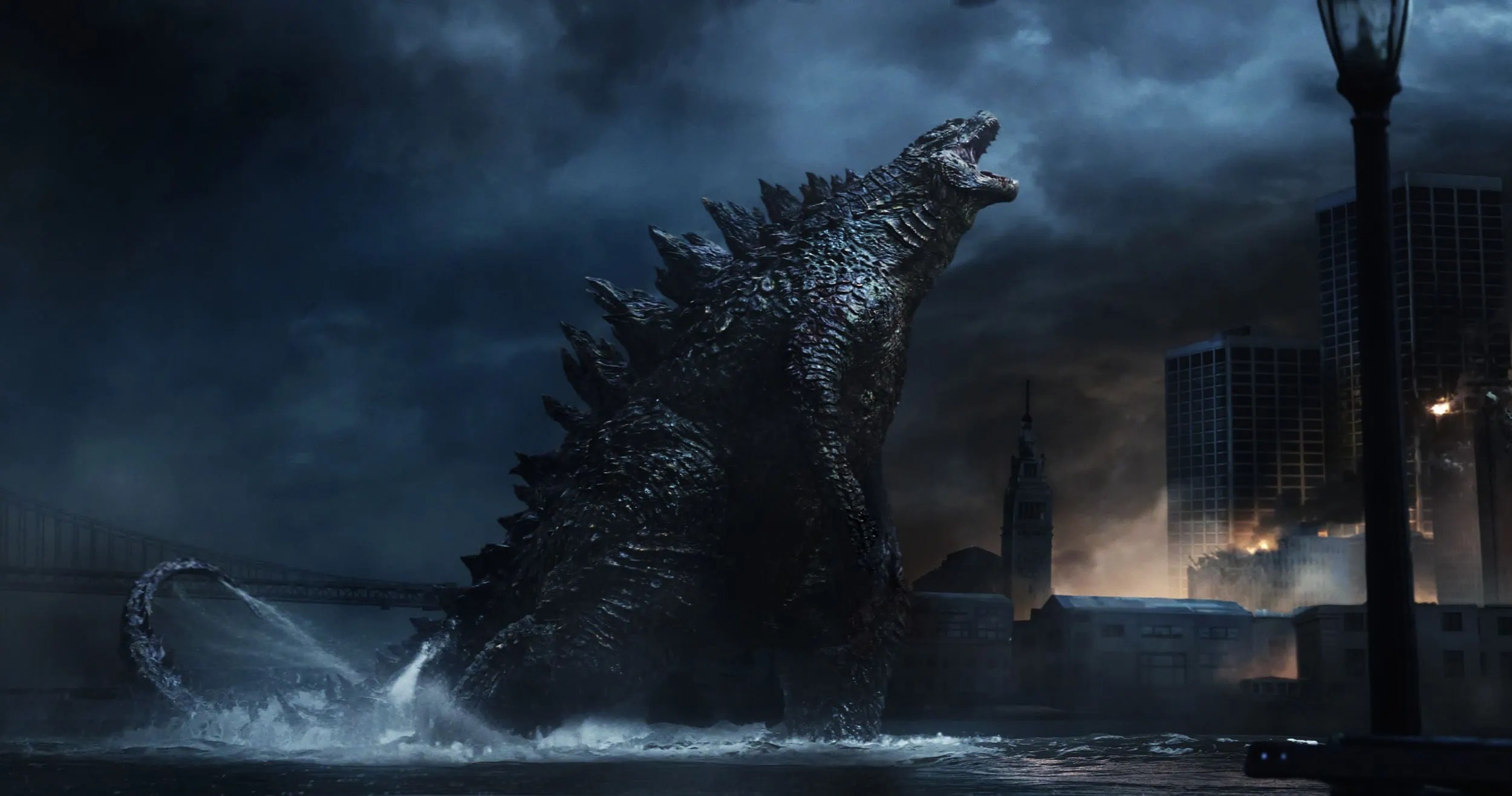 Godzilla yelling. This image is part of an article about how the MonsterVerse is doing what the Snyderverse couldn't.