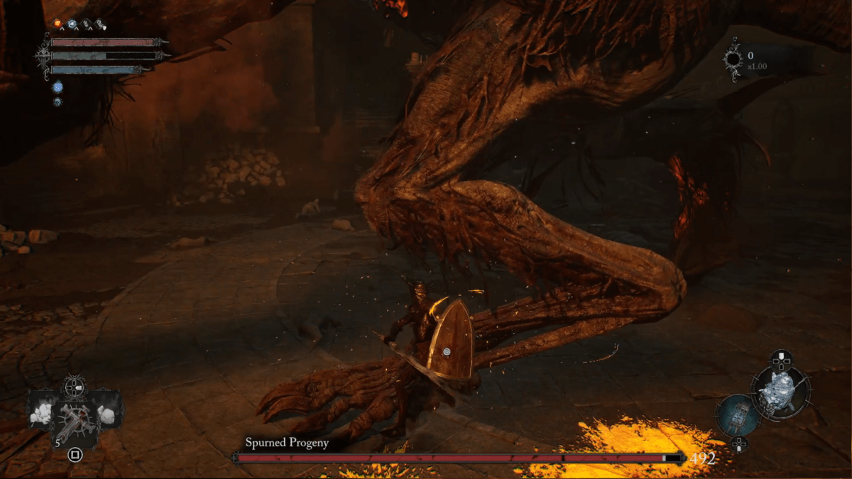 attacking the spurned progeny's legs as part of a guide on how to beat the boss in Lords of the Fallen.