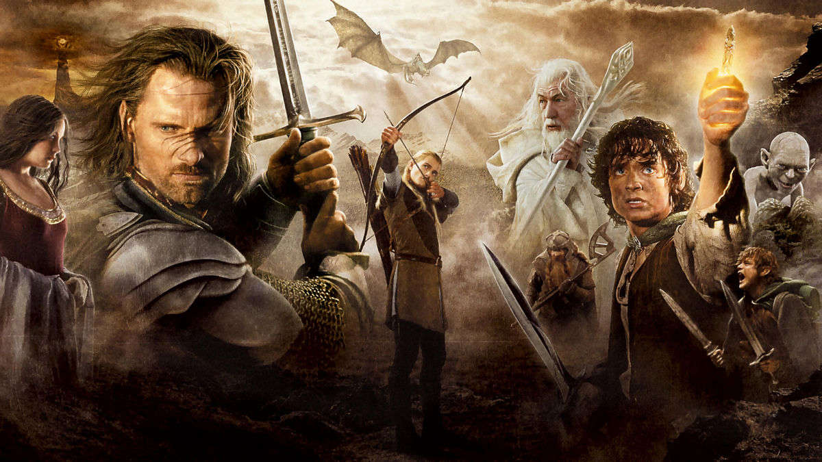 The poster for Lord of the Rings: Return of the King showing the various characters standing in heroic poses while a Nazgul watches on in the background as part of an article on the wildest trivia from production on the trilogy.