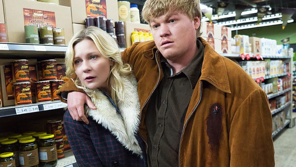 A woman carrying a man in Fargo. The image is part of an article ranking every season of Fargo from worst to best.
