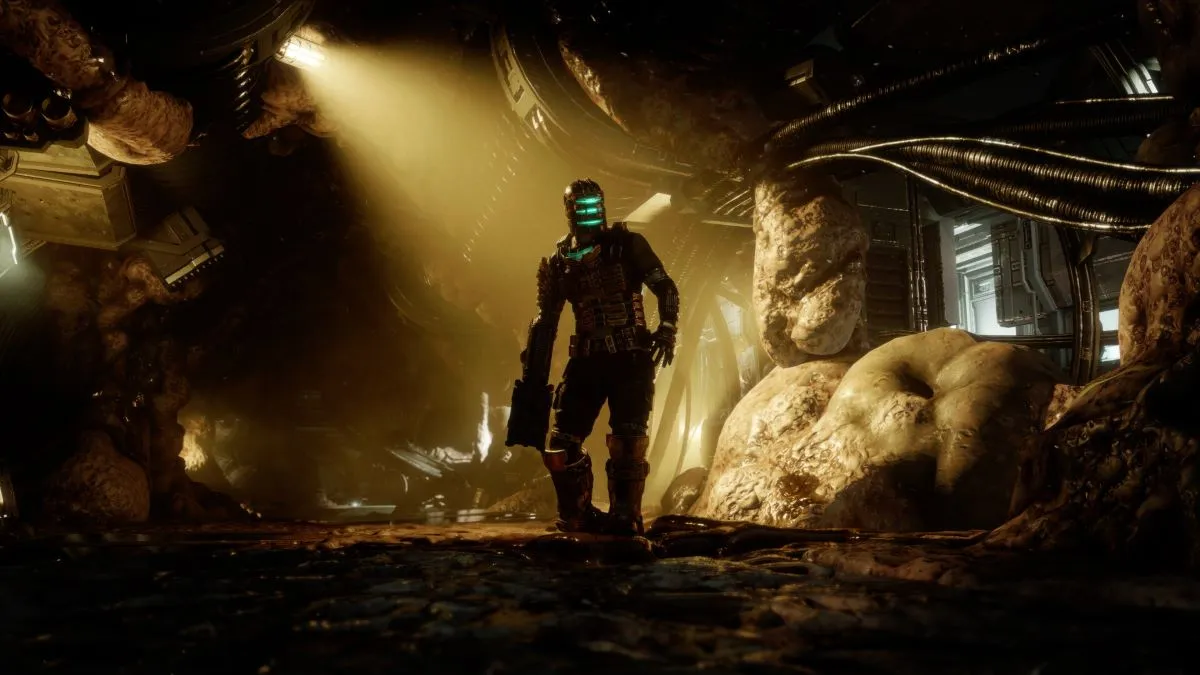 Dead Space protagonist Isaac Clarke stands silhouetted against evocative yellow crepuscular rays.