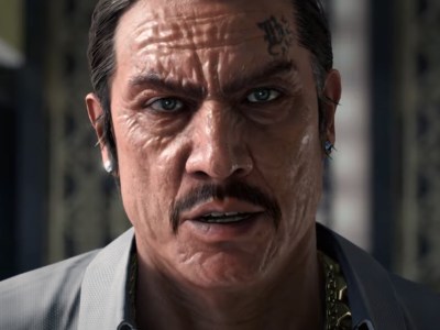 An image of Danny Trejo as Dwight in Like a Dragon: Infinite Wealth. He's a scarred-faced man with a tattoo above his right eyebrow.