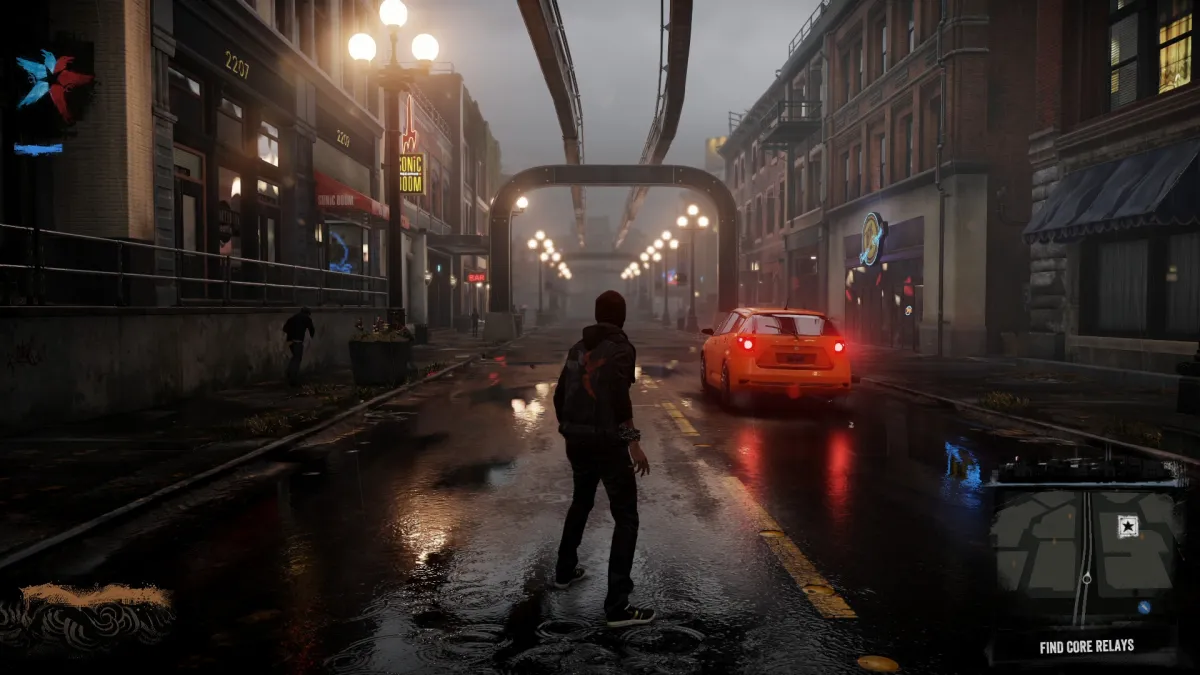 An image from Infamous: Second Sun in which Delsin stands in the streets of Seatle. The image is part of an article on the best games like Marvel's Spider-Man 2.