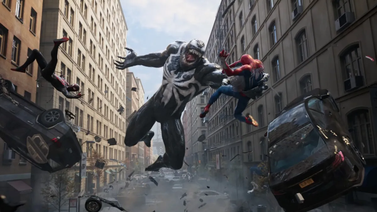 Venom fighting Peter Parker and Miles Morales in Marvel's Spider-Man 2.