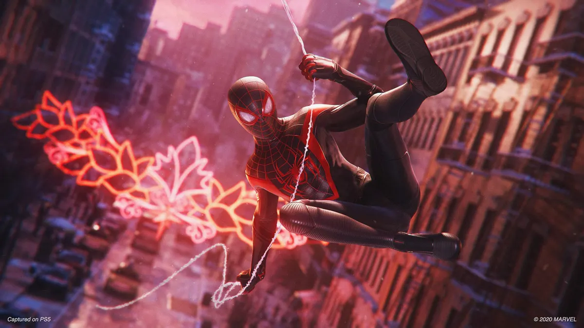 Miles Morales swinging as part of all major spider-man games ranked.