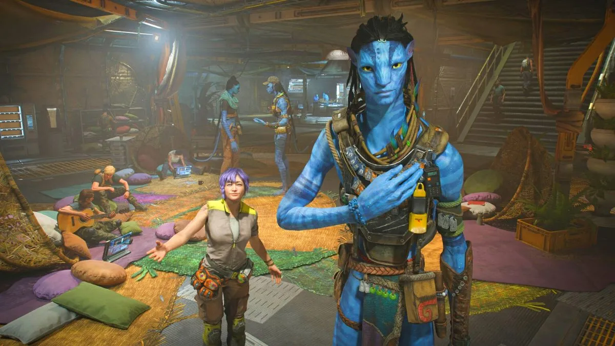 A Na'vi and a human together at a camp in Avatar: Frontiers of Pandora.
