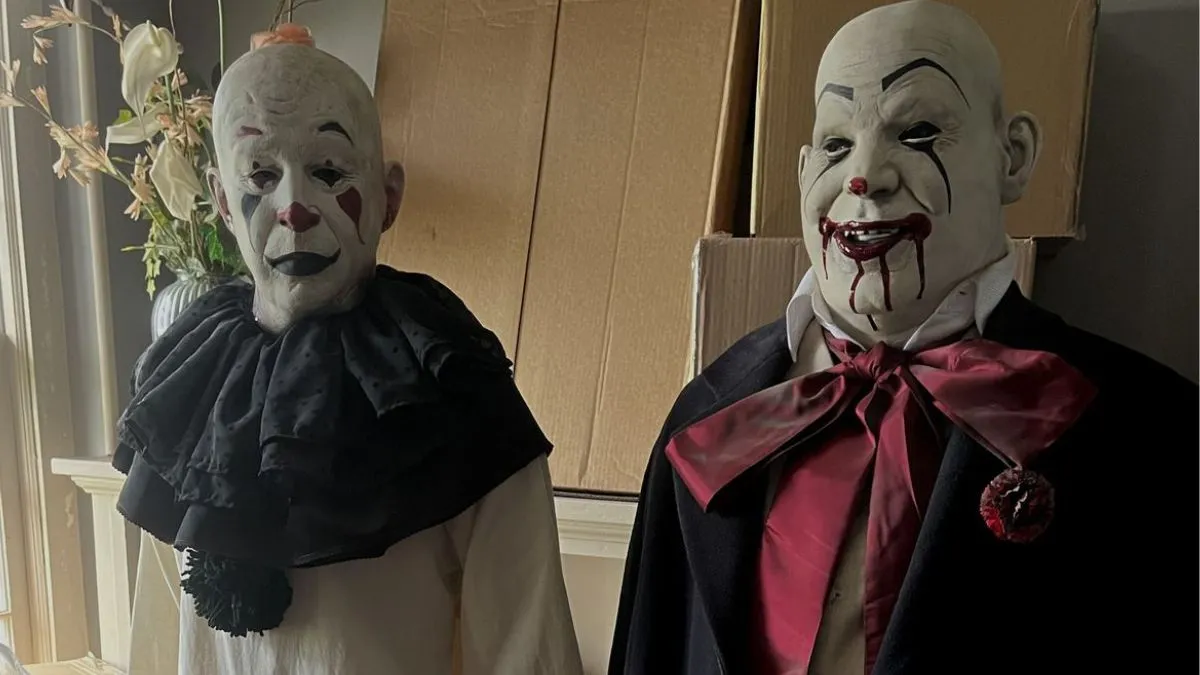Two clowns looking creepy. This image is part of an article about the best horror movies of 2023.
