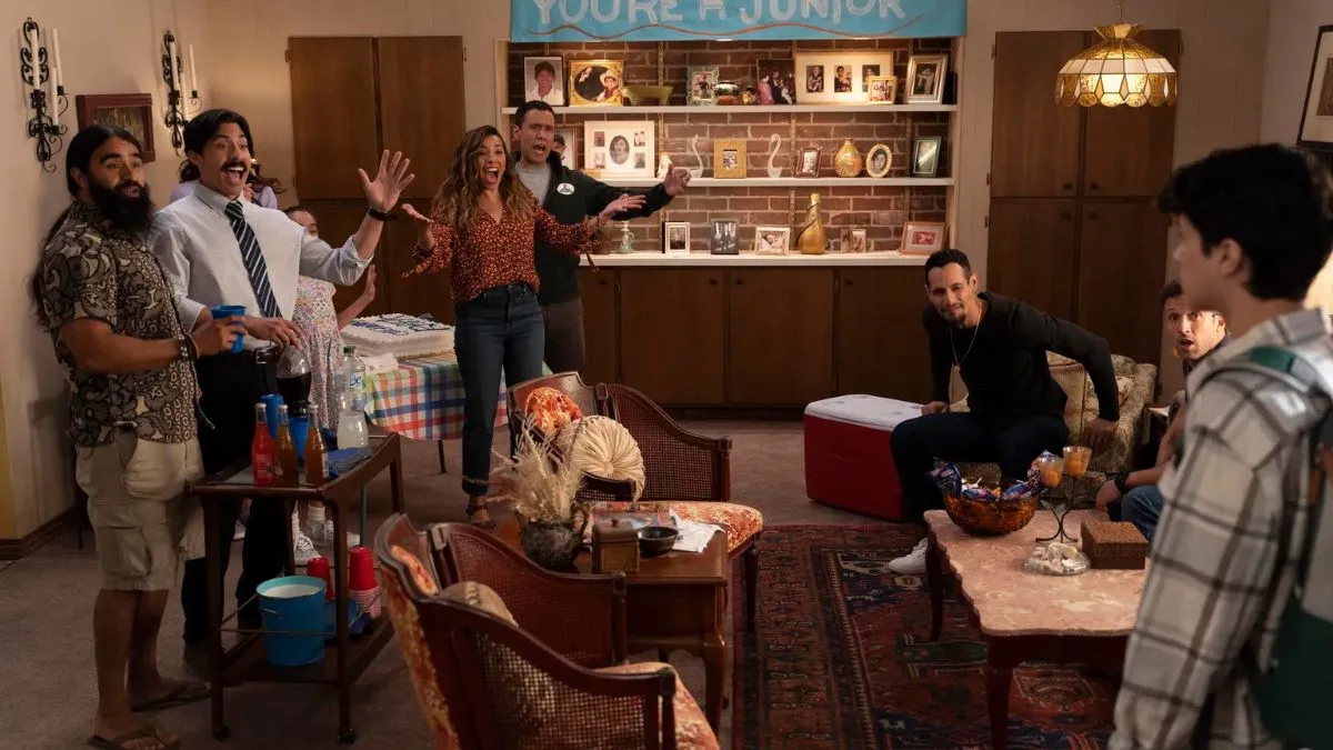 The family acting surprised in Primo. This image is part of an article about the best TV comedies of 2023.