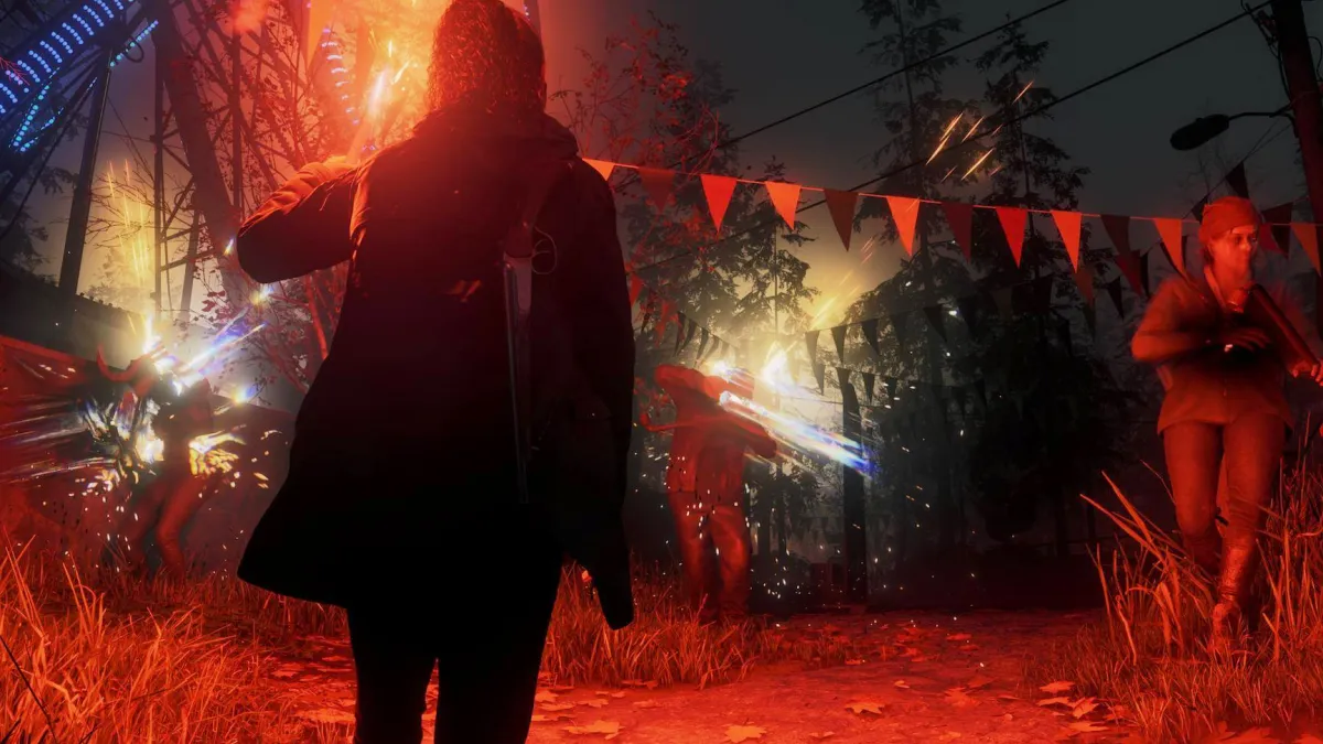 A woman in a coat, facing enemies in an area lit by red lighting in Alan Wake 2. This image is part of an article about patch notes for Alan Wake 2 Update 13: The Final Draft.