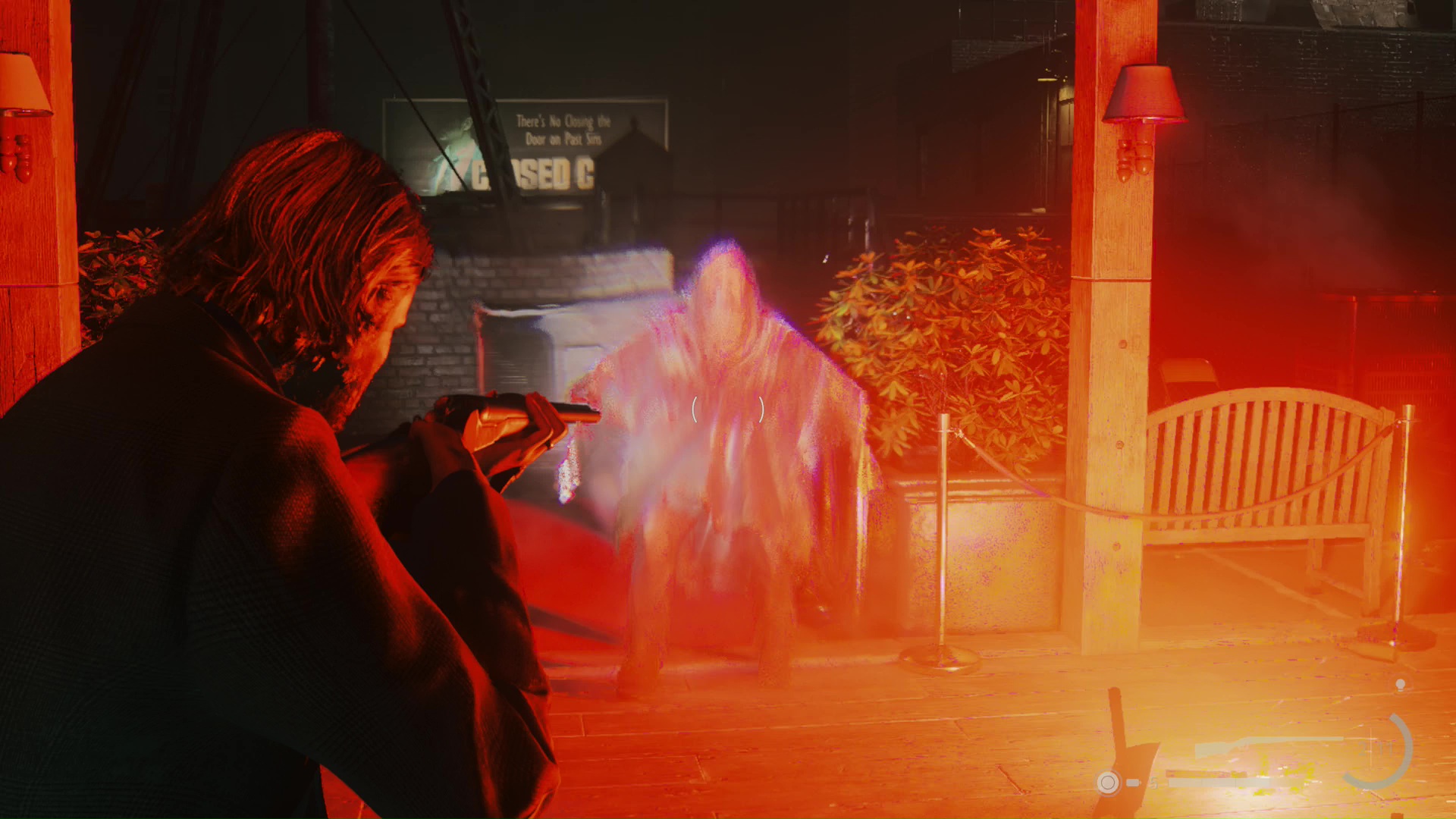 Alan Wake holding a gun in Alan Wake 2. This image is part of an article about the best horror games in 2023.