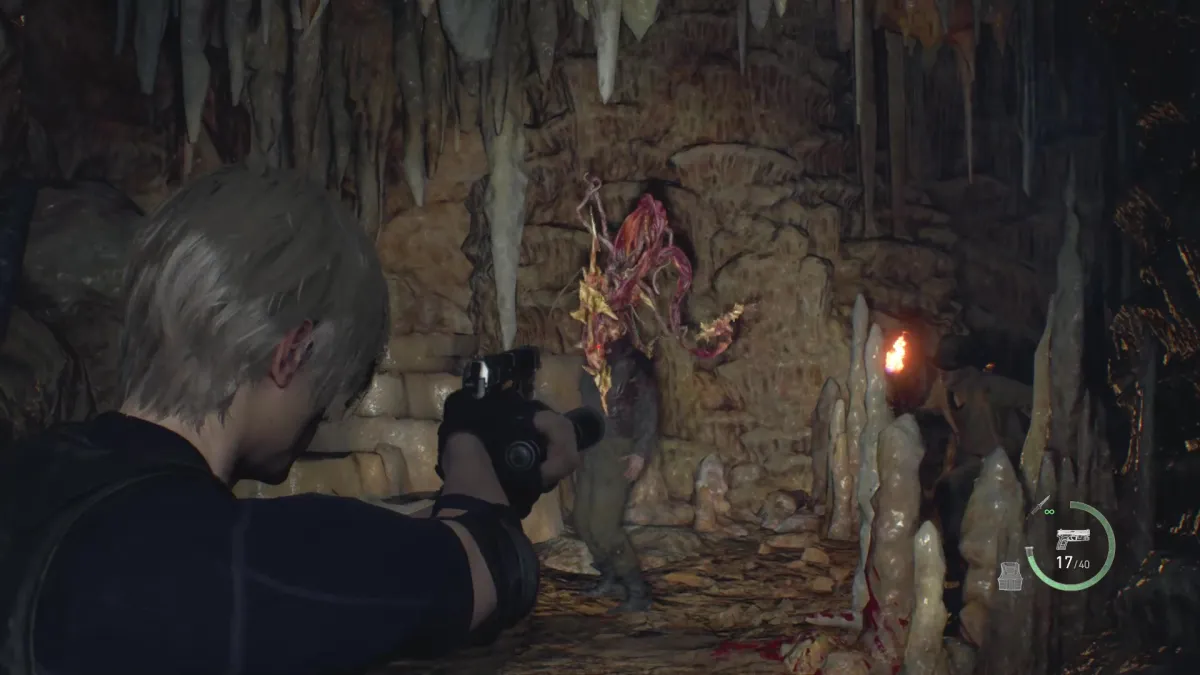 A monster being shot in Resident Evil 4. This image is part of an article about the best horror games in 2023.