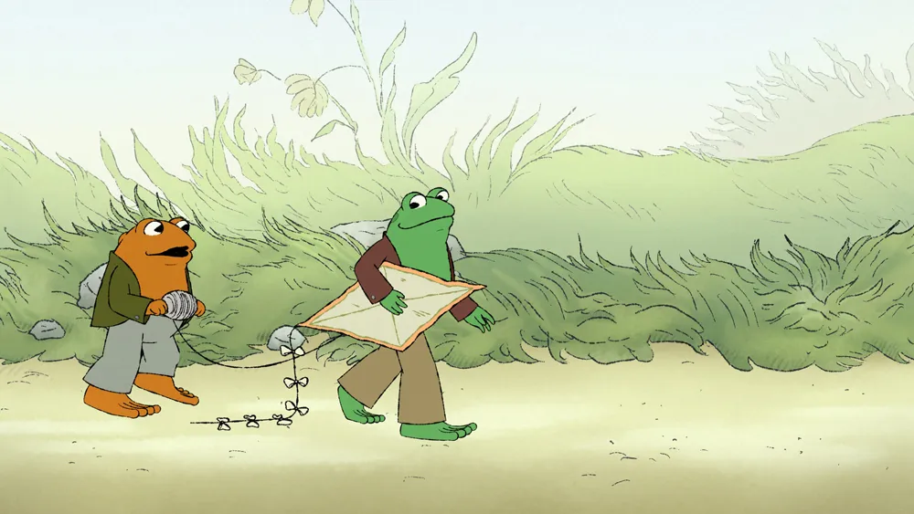 Frog and Toad walking down the road. This image is part of an article about the best animated tv shows of 2023.