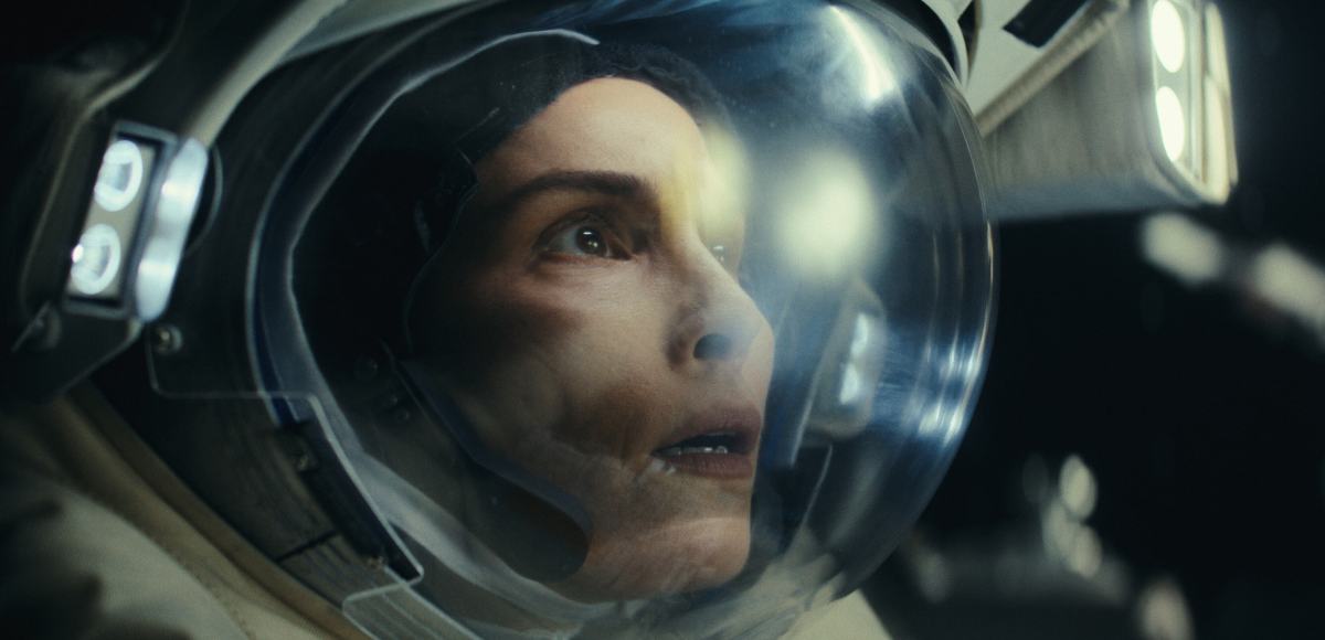 Noomi Rapace in a spacesuit