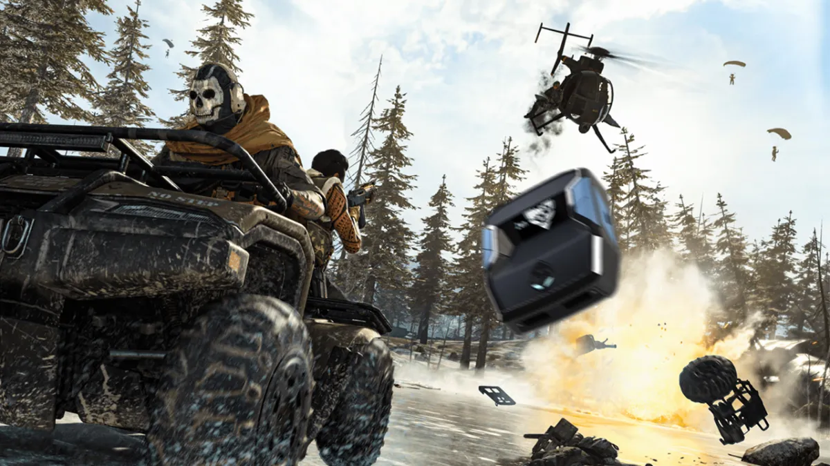 An ATV racing away from an explosion, with a blurred Cronus Zen device flying out from the explosion. This image is part of an article about PS5 blocking a popular MW3 and Warzone cheating hardware.