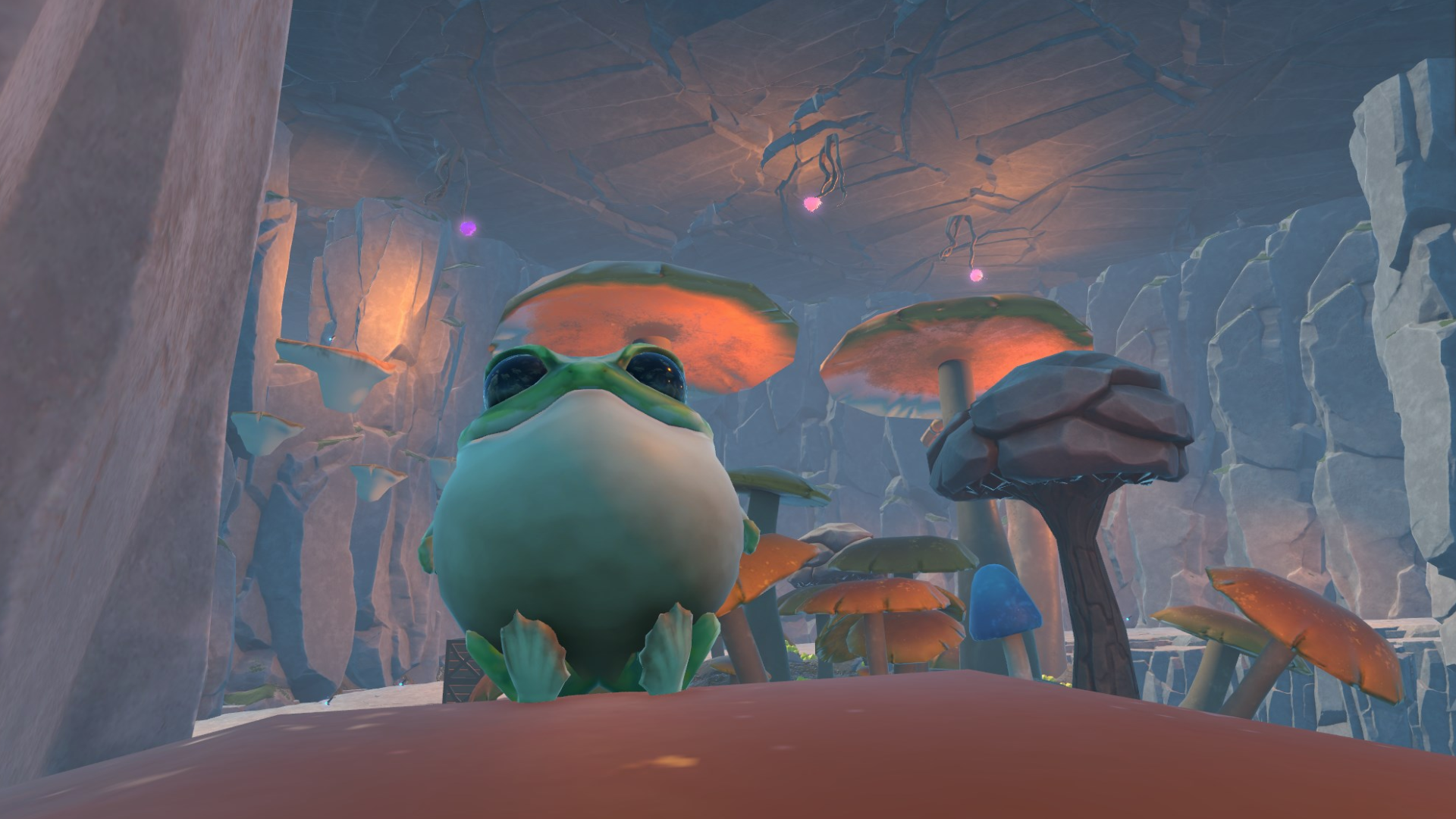 This image shows the round frog smiling.