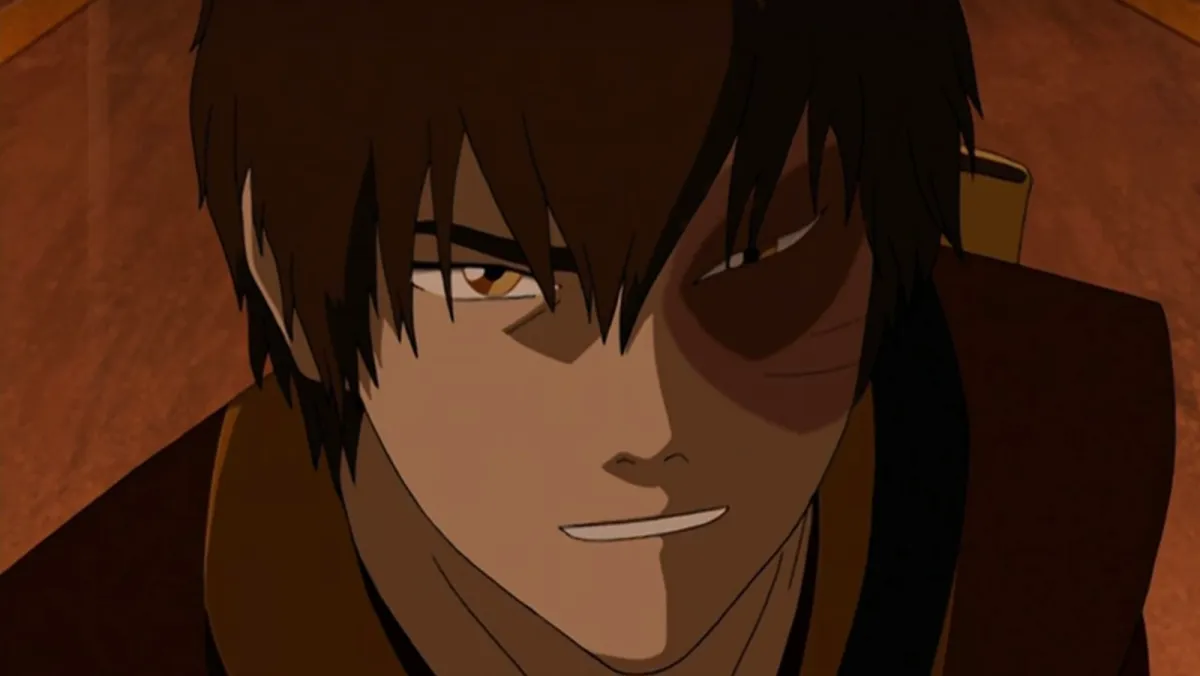Zuko looking angry in Avatar: The Last Airbender. This image is part of an article about What Happened to Zuko's Mom in Avatar: The Last Airbender, Answered and another about how to get the Toph and Zuko skins in Fortnite.