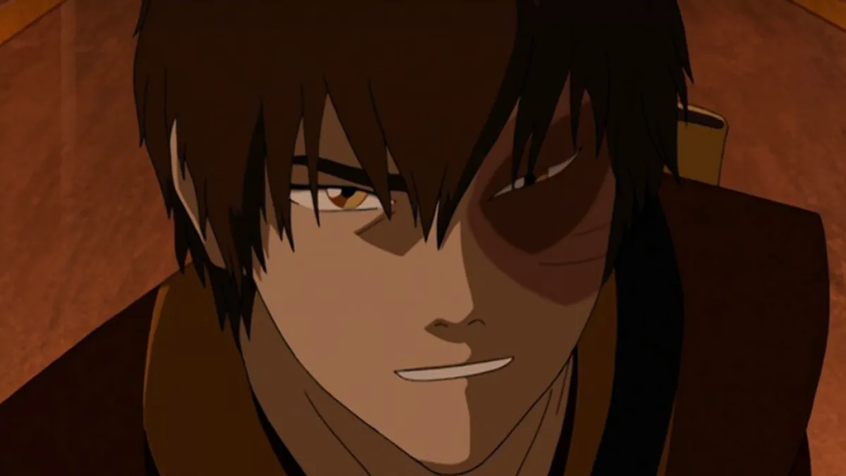 Zuko looking angry in Avatar: The Last Airbender. This image is part of an article about What Happened to Zuko's Mom in Avatar: The Last Airbender, Answered and another about how to get the Toph and Zuko skins in Fortnite.