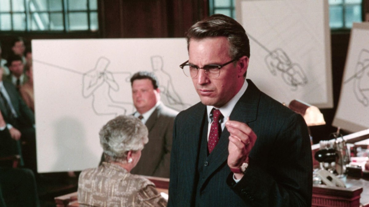 Kevin Costner as Jim Garrison in JFK. This image is part of an article about Oppenheimer: 5 double-feature alternatives better than Barbie.