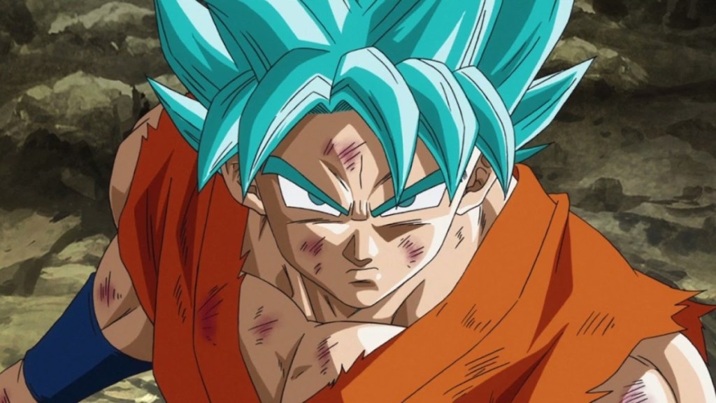 Goku battle-damaged and transformed into Super Saiyan Blue