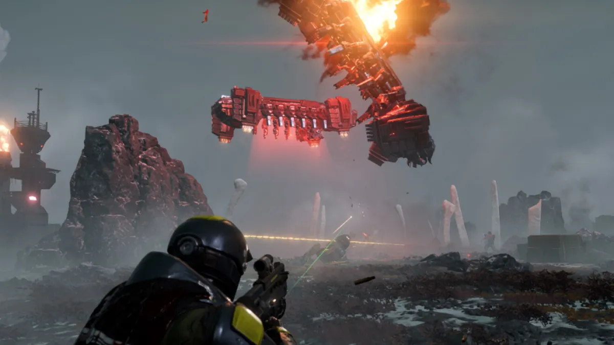 A man in a sci-fi set of armour shootingaway as two space-ships crash in front of him. This image is part of an article about how Helldivers 2 is fun but struggles to push beyond that.
