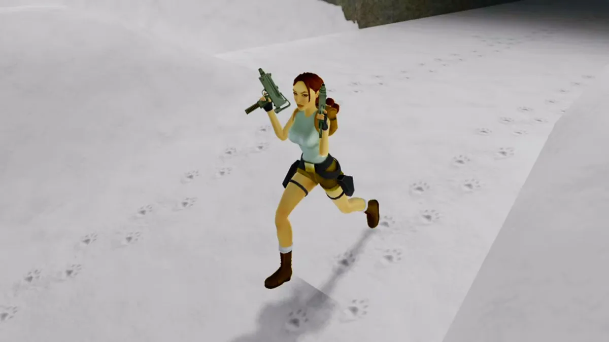 Lara Croft in Tomb Raider I-III Remastered, with a pair of uzi guns. The image is part of a guide to all the cheat codes for Tomb Raider I-III Remastered.