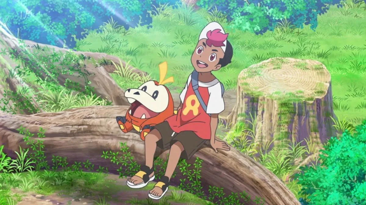El Pokémon Fuecoco sentado con su entrenador, Roy.